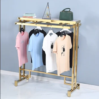 Рафтове за търговски изложения на продукти от розово злато, закачалка за дрехи Nakajima, етаж висящи рафтове за търговски изложения на продукти, паралелна греда, рафт